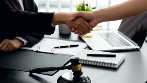 a handshake between the abuse coordinator and the client in a nursing home